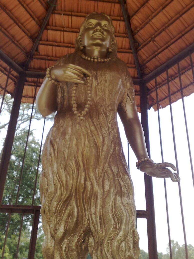 Statue of Akka Mahadevi, the twelfth-century Lingayat saint of Karnataka, her hair flowing as her only covering, at her birthplace in Udathadi